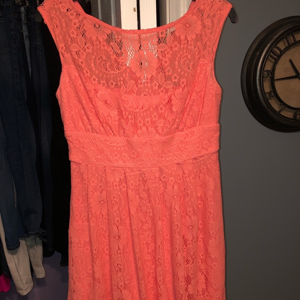 Coral lace dress worn as bridesmaid